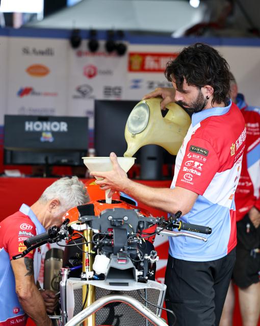 (260905) -- MAGNY-COURS, Sept. 5, 2026 (Xinhua) -- A technician of EASTROC ZXMOTO Evan Bros Factory works in the pitlane before the race 1 of WorldSSP at the FIM Supersport World Championship French Round in Magny-Cours, France, Sept. 5, 2026. (Xinhua/Wu Huiwo)