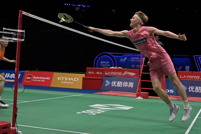 (260905) -- SHENZHEN, Sept. 5, 2026 (Xinhua) -- Anders Antonsen hits a return during the men's singles semifinal match between Jason Gunawan of China's Hong Kong and Anders Antonsen of Denmark at China Masters 2026 badminton tournament in Shenzhen, south China's Guangdong Province, Sept. 5, 2026. (Photo by Chu Yan/Xinhua)