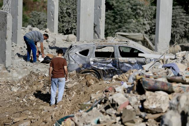 (260905) -- MAYFADOUN, Sept. 5, 2026 (Xinhua) -- People inspect the destruction from Israeli airstrikes that led to the death of a woman in Mayfadoun, southern Lebanon, Sept. 5, 2026. A Lebanese woman was killed and five other people injured Saturday in Israeli airstrikes targeting towns in southern Lebanon, according to Lebanon's official National News Agency (NNA). (Photo by Ali Hashisho/Xinhua)