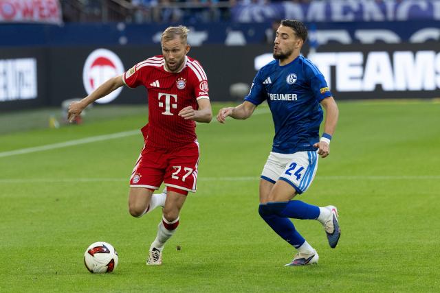 (260906) -- GELSENKIRCHEN, Sept. 6, 2026 (Xinhua) -- Adil Aouchiche (R) of FC Schalke 04 vies with Konrad Laimer of FC Bayern Munich during the German first division Bundesliga football match between FC Schalke 04 and FC Bayern Munich in Gelsenkirchen, Germany, Sept. 5, 2026. (Photo by Joachim Bywaletz/Xinhua)