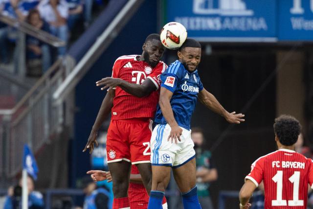(260906) -- GELSENKIRCHEN, Sept. 6, 2026 (Xinhua) -- Moussa Sylla (top R) of FC Schalke 04 and Dayot Upamecano of FC Bayern Munich head for the ball during the German first division Bundesliga football match between FC Schalke 04 and FC Bayern Munich in Gelsenkirchen, Germany, Sept. 5, 2026. (Photo by Joachim Bywaletz/Xinhua)