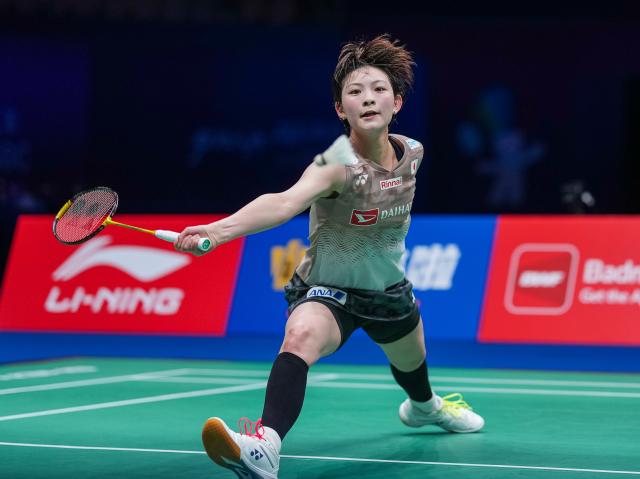 (260906) -- SHENZHEN, Sept. 6, 2026 (Xinhua) -- Miyazaki Tomoka of Japan hits a return during the women's singles final match against An Se Young of South Korea at China Masters 2026 badminton tournament in Shenzhen, south China's Guangdong Province, Sept. 6, 2026. (Xinhua/Sun Fei)