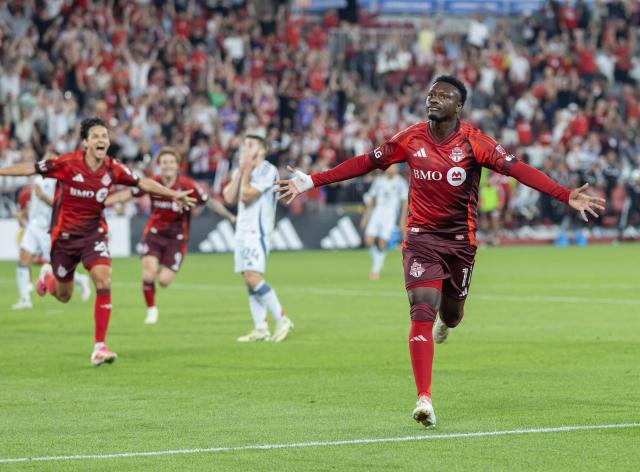 (260906) -- TORONTO, Sept. 6, 2026 (Xinhua) -- Derrick Etienne Jr. (1st R) of Toronto FC celebrates scoring during the 2026 Major League Soccer (MLS) regular season match between Toronto FC and Chicago Fire FC at BMO Field in Toronto, Canada, Sept. 5, 2026. (Photo by Zou Zheng/Xinhua)