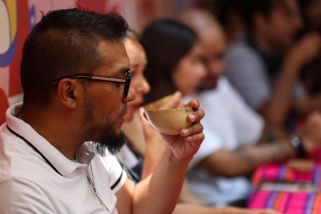 (260906) -- MEXICO CITY, Sept. 6, 2026 (Xinhua) -- A man samples alcoholic beverages during the Pulque, Traditional Cuisine and Mezcal Festival in Mexico City, capital of Mexico, Sept. 5, 2026. The event, featuring more than 100 varieties and expressions of agave-based beverages, as well as tastings, food pairings and other activities, was held in Mexico City on Saturday. (Photo by Francisco Canedo/Xinhua)