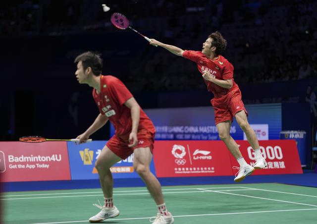 (260906) -- SHENZHEN, Sept. 6, 2026 (Xinhua) -- He Jiting (R)/Ren Xiangyu compete during the men's doubles final match between He Jiting/Ren Xiangyu of China and Satwiksairaj Rankireddy/Chirag Shetty of India at China Masters 2026 badminton tournament in Shenzhen, south China's Guangdong Province, Sept. 6, 2026. (Xinhua/Sun Fei)