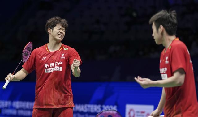 (260906) -- SHENZHEN, Sept. 6, 2026 (Xinhua) -- He Jiting (L)/Ren Xiangyu react during the men's doubles final match between He Jiting/Ren Xiangyu of China and Satwiksairaj Rankireddy/Chirag Shetty of India at China Masters 2026 badminton tournament in Shenzhen, south China's Guangdong Province, Sept. 6, 2026. (Xinhua/Sun Fei)