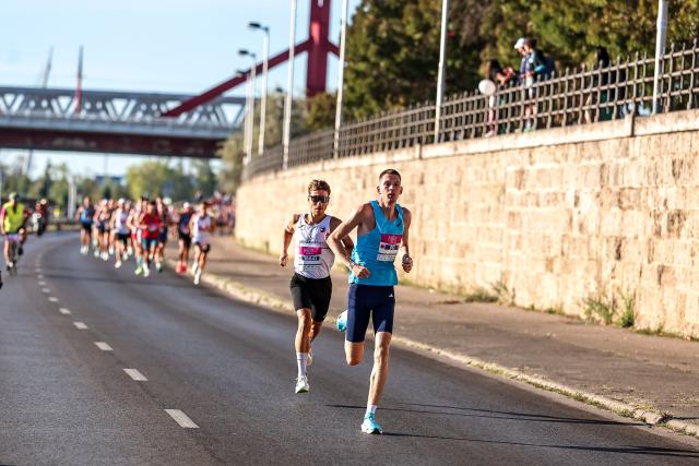 (260906) -- BUDAPEST, Sept. 6, 2026 (Xinhua) -- Gabor Karsai (R) of Hungary and Riccardo Mugnosso of Italy compete in the 41st Wizz Air Budapest Half Marathon in Budapest, Hungary, Sept. 6, 2026. (Photo by David Balogh/Xinhua)