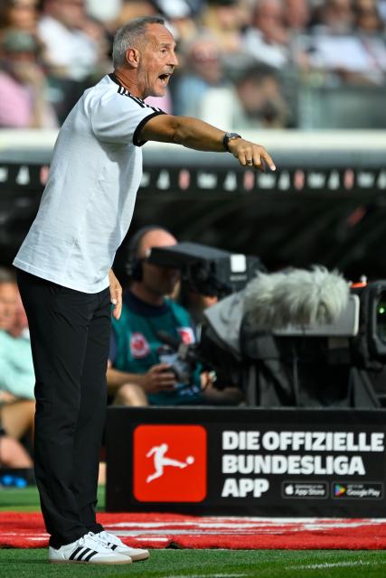 (260907) -- FRANKFURT, Sept. 7, 2026 (Xinhua) -- Adi Huetter, head coach of Eintracht Frankfurt, gestures during the German first division Bundesliga football match between Eintracht Frankfurt and FC Augsburg in Frankfurt, Germany, Sept. 6, 2026. (Photo by Ulrich Hufnagel/Xinhua)