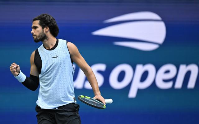 (260907) -- NEW YORK, Sept. 7, 2026 (Xinhua) -- Carlos Alcaraz of Spain reacts during the men's singles fourth round match between Carlos Alcaraz of Spain and Tommy Paul of the United States, at the 2026 US Open tennis championships in New York, the United States, Sept. 6, 2026. (Xinhua/Li Rui)