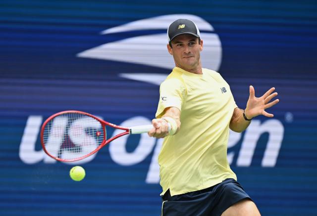 (260907) -- NEW YORK, Sept. 7, 2026 (Xinhua) -- Tommy Paul of the United States hits a return during the men's singles fourth round match between Carlos Alcaraz of Spain and Tommy Paul of the United States, at the 2026 US Open tennis championships in New York, the United States, Sept. 6, 2026. (Xinhua/Li Rui)