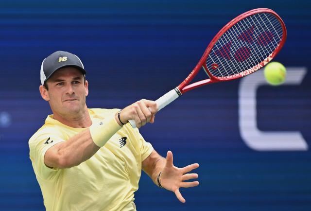 (260907) -- NEW YORK, Sept. 7, 2026 (Xinhua) -- Tommy Paul of the United States hits a return during the men's singles fourth round match between Carlos Alcaraz of Spain and Tommy Paul of the United States, at the 2026 US Open tennis championships in New York, the United States, Sept. 6, 2026. (Xinhua/Li Rui)