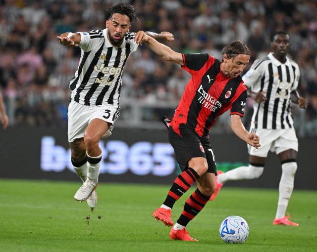 (260907) -- TURIN, Sept. 7, 2026 (Xinhua) -- Juventus' Nico Gonzalez (L) vies with AC Milan's Luka Modric (C) during a Serie A football match between Napoli and AC Milan in Turin, Italy, Sept. 6, 2026. (Photo by Alberto Lingria/Xinhua)
