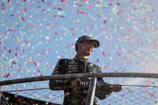(260907) -- MONZA, Sept. 7, 2026 (Xinhua) -- Mercedes' George Russell of Britain celebrates on the podium after the Formula 1 Italian Grand Prix at Monza Circuit, near Milan, Italy, on Sept. 6, 2026. (Xinhua/Li Jing)