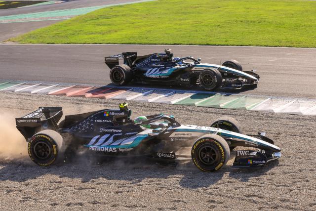 (260907) -- MONZA, Sept. 7, 2026 (Xinhua) -- Mercedes' Kimi Antonelli (front) of Italy races with George Russell of Britain during the Formula 1 Italian Grand Prix at Monza Circuit, near Milan, Italy, on Sept. 6, 2026. (Photo by Bao Di/Xinhua)