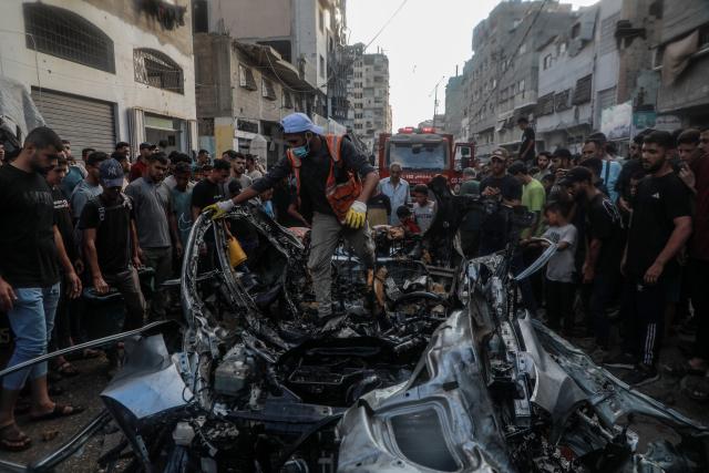 (260907) -- GAZA, Sept. 7, 2026 (Xinhua) -- A Palestinian checks a destroyed vehicle following an Israeli drone strike in the al-Nasr neighborhood, west of Gaza City, on Sept. 6, 2026. Two Palestinians, including a child, were killed and several others injured on Sunday in an Israeli strike targeting a vehicle west of Gaza City, according to medical and local sources. (Photo by Rizek Abdeljawad/Xinhua)