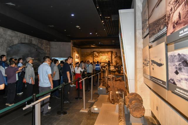 (260907) -- WEIHAI, Sept. 7, 2026 (Xinhua) -- People visit an exhibition hall of the Museum of the Sino-Japanese War of 1894-1895, on Liugong Island in Weihai City, east China's Shandong Province, Sept. 7, 2026. (Xinhua/Zhu Zheng)