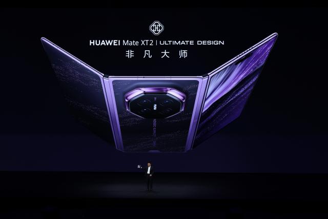 (260907) -- GUANGZHOU, Sept. 7, 2026 (Xinhua) -- This photo taken on Sept. 7, 2026 shows a scene at a launch event for Huawei's Mate XT 2 tri-fold smartphone powered by the new Kirin 9050 Pro chip in Guangzhou, south China's Guangdong Province. Chinese tech giant Huawei on Monday launched the Mate XT 2 tri-fold smartphone powered by the new Kirin 9050 Pro chip, the first high-performance processor to use logic folding technology.
  The Kirin 9050 Pro stacks logic units in layers within a single chip, shortening signal transmission paths, reducing latency and boosting overall performance, according to a launch event in Guangzhou.
  The last time Huawei introduced a new Kirin chip at a flagship launch was at the global release of the Mate 40 smartphone six years ago. The company has continued to innovate and break new ground in recent years. (Xinhua/Mao Siqian)
