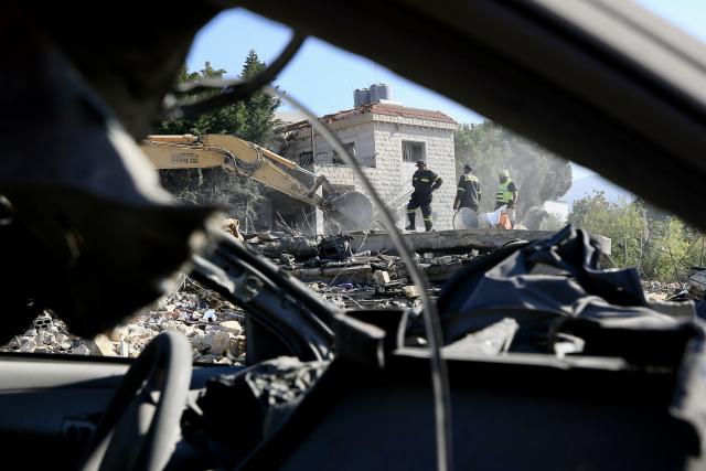 (260907) -- KFAR ROUMMANE, Sept. 7, 2026 (Xinhua) -- People inspect buildings destroyed by Israeli airstrikes in Kfar Roummane, Lebanon, Sept. 7, 2026. At least 11 people were killed and five others wounded in Israeli airstrikes on the town of Kfar Roummane in southern Lebanon early Monday, according to Lebanon's National News Agency (NNA). (Photo by Ali Hashisho/Xinhua)