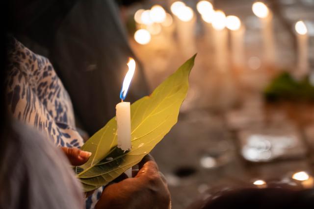 (260907) -- LALITPUR, Sept. 7, 2026 (Xinhua) -- People hold candlelight vigils to mourn the victims of the deadly mudslide, in Lalitpur, Nepal, Sept. 7, 2026. Nepal holds a national day of mourning Monday to mourn the victims of the deadly mudslide, with President Ram Chandra Poudel calling for continued search and rescue efforts and national unity in the face of the disaster. (Photo by Hari Maharjan/Xinhua)