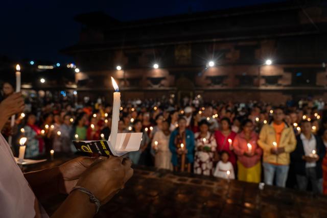 (260907) -- LALITPUR, Sept. 7, 2026 (Xinhua) -- People hold candlelight vigils to mourn the victims of the deadly mudslide, in Lalitpur, Nepal, Sept. 7, 2026. Nepal holds a national day of mourning Monday to mourn the victims of the deadly mudslide, with President Ram Chandra Poudel calling for continued search and rescue efforts and national unity in the face of the disaster. (Photo by Hari Maharjan/Xinhua)