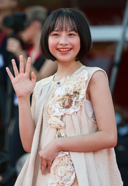 (260907) -- VENICE, Sept. 7, 2026 (Xinhua) -- Japanese actress Fuuri Nanase of the film "Look Back" poses at the red carpet before the premiere of the film during the 83rd Venice International Film Festival in Venice, Italy, Sept. 7, 2026. (Xinhua/Wang Kaiyan)
