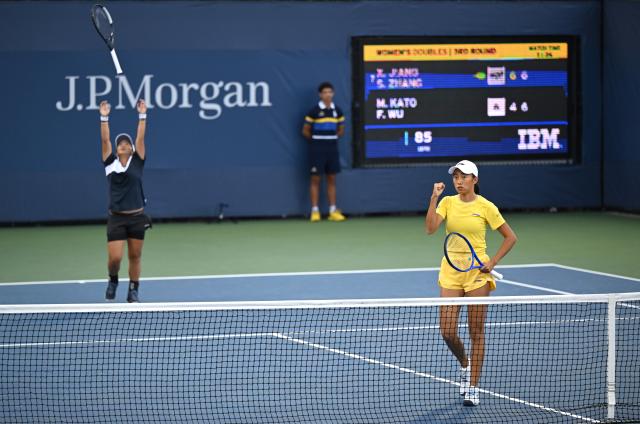 (260908) -- NEW YORK, Sept. 8, 2026 (Xinhua) -- Zhang Shuai (R)/Jiang Xinyu celebrate after winning the women's doubles third round match between China's Zhang Shuai/Jiang Xinyu and Kato Miyu (Japan)/Wu Fang-Hsien (Chinese Taipei) at the 2026 US Open tennis championships in New York, the United States, Sept. 7, 2026. (Xinhua/Li Rui)