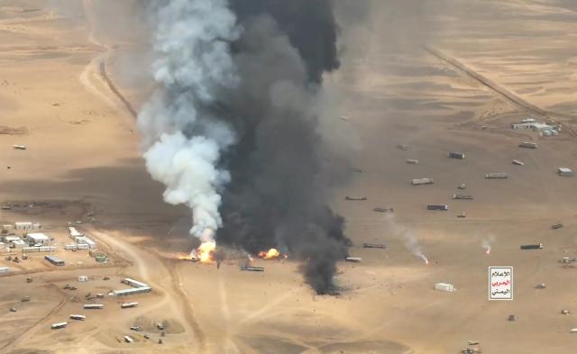 (260908) -- HADRAMOUT, Sept. 8, 2026 (Xinhua) -- A screenshot shows trucks burning after they were targeted by ballistic missiles launched by Houthi group near Al-Wadiah military camp in Hadramout province, Yemen on Sept. 7, 2026. Yemen's Houthi group said Monday that it had carried out a ballistic missile strike on trucks it claimed were transporting military equipment from Saudi Arabia to the Al-Wadiah military camp in Yemen's government-controlled southeastern province of Hadramout. (Houthi Media Center/Handout via Xinhua)
