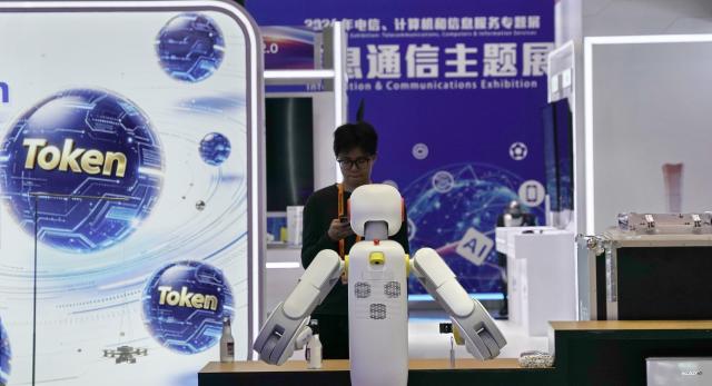 (260908) -- BEIJING, Sept. 8, 2026 (Xinhua) -- This photo taken on Sept. 8, 2026 shows a view of the booth of a telecommunications company at an exhibition hall of the 2026 China International Fair for Trade in Services (CIFTIS) in Beijing, capital of China. The 2026 CIFTIS held a media preview event here on Tuesday. This year's CIFTIS, set to be held from Sept. 9 to 13 in Beijing, will bring together exhibitors from over 90 countries and international organizations, along with more than 1,800 companies. (Photo by Bi Shanghong/Xinhua)