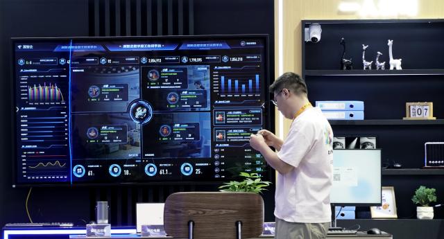 (260908) -- BEIJING, Sept. 8, 2026 (Xinhua) -- This photo taken on Sept. 8, 2026 shows a view of the booth of a sci-tech company at an exhibition hall of the 2026 China International Fair for Trade in Services (CIFTIS) in Beijing, capital of China. The 2026 CIFTIS held a media preview event here on Tuesday. This year's CIFTIS, set to be held from Sept. 9 to 13 in Beijing, will bring together exhibitors from over 90 countries and international organizations, along with more than 1,800 companies. (Photo by Bi Shanghong/Xinhua)