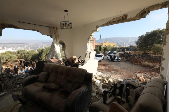 (260908) -- NABLUS, Sept. 8, 2026 (Xinhua) -- Palestinians inspect a building after the Israeli forces destroyed it, in the town of Aqraba, south of Nablus in the West Bank, on Sept. 8, 2026. A Palestinian man was killed by Israeli army fire on Tuesday in the town of Aqraba, south of Nablus in the northern West Bank. (Photo by Nidal Eshtayeh/Xinhua)