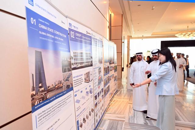 (260908) -- KUWAIT, Sept. 8, 2026 (Xinhua) -- People visit the booth of China State Construction Engineering Corporation Ltd. (CSCEC) Kuwait during the Housing and Urban Development Forum 2026 in Hawalli Governorate, Kuwait, Sept. 8, 2026. The Housing and Urban Development Forum 2026 opened here on Tuesday alongside the sixth edition of the Baiti Building Exhibition, bringing together government officials, investors, developers and companies from Kuwait's housing, real estate and construction sectors. (Photo by Asad/Xinhua)