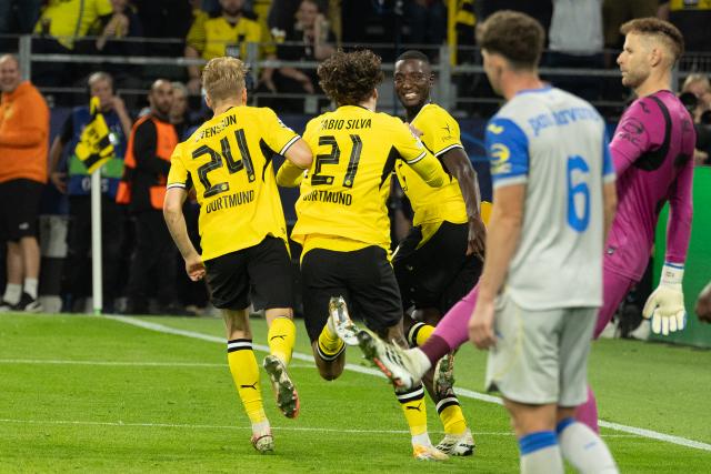 (260909) -- DORTMUND, Sept. 9, 2026 (Xinhua) -- Serhou Guirassy (3rd L, front) of Borussia Dortmund celebrates scoring during the UEFA Champions League football match between Borussia Dortmund and Villarreal in Dortmund, Germany, Sept. 8, 2026. (Photo by Joachim Bywaletz/Xinhua)