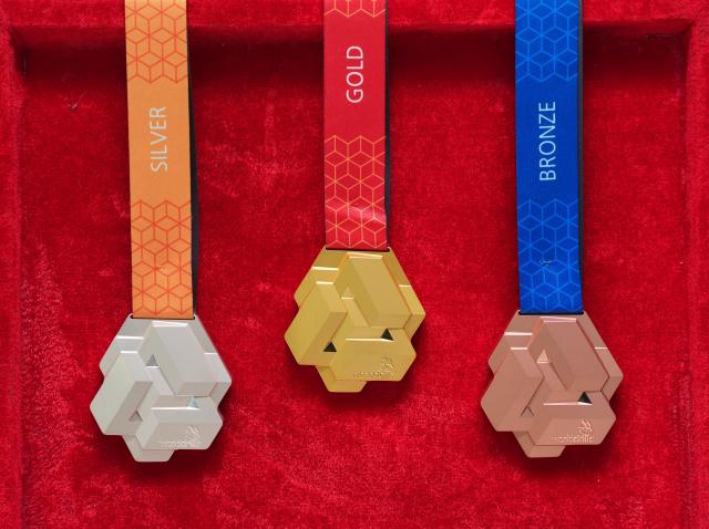 (260909) -- BEIJING, Sept. 9, 2026 (Xinhua) -- This photo taken on Sept. 8, 2026 shows the gold, silver and bronze medals of the 48th WorldSkills Competition at Shanghai Mint Co., Ltd. in east China's Shanghai. Shanghai Mint Co., Ltd. has officially shipped all the medals for the 48th WorldSkills Competition, which will be awarded at the competition scheduled to take place in Shanghai from Sept. 22 to 27. (Xinhua/Liu Ying)