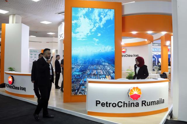 (260909) -- BAGHDAD, Sept. 9, 2026 (Xinhua) -- People walk past the booth of PetroChina during the 4th Iraq International Exhibition and Conference for Oil, Gas and Petroleum Projects at the Baghdad International Fairgrounds in Bagdad, Iraq, Sept. 8, 2026.
  TO GO WITH "Roundup: Chinese energy firms showcase tech, commitment to cooperation at Iraq int'l oil, gas expo" (Xinhua/Khalil Dawood)