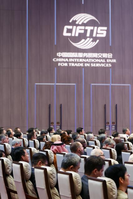 (260909) -- BEIJING, Sept. 9, 2026 (Xinhua) -- People attend the Global Trade in Services Summit of the 2026 China International Fair for Trade in Services (CIFTIS) in Beijing, capital of China, Sept. 9, 2026. The summit opened here on Wednesday. (Xinhua/Chen Yichen)