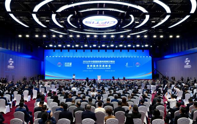 (260909) -- BEIJING, Sept. 9, 2026 (Xinhua) -- This photo taken on Sept. 9, 2026 shows a scene of the Global Trade in Services Summit of the 2026 China International Fair for Trade in Services (CIFTIS) in Beijing, capital of China, Sept. 9, 2026. The summit opened here on Wednesday. (Xinhua/Zhang Xiaoyu)