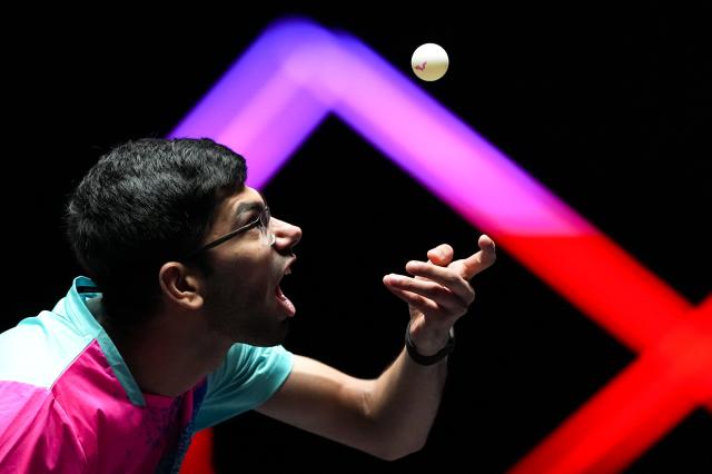 (260909) -- MACAO, Sept. 9, 2026 (Xinhua) -- Manav Thakkar serves during the men's singles round of 32 match between Manav Thakkar of India and Alexis Lebrun of France at the 2026 World Table Tennis (WTT) Champions Macao in Macao, south China, Sept. 9, 2026. (Xinhua/Cheong Kam Ka)
