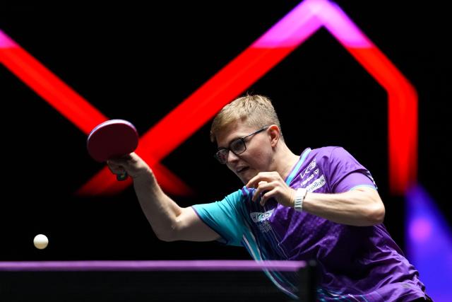 (260909) -- MACAO, Sept. 9, 2026 (Xinhua) -- Alexis Lebrun hits a return during the men's singles round of 32 match between Manav Thakkar of India and Alexis Lebrun of France at the 2026 World Table Tennis (WTT) Champions Macao in Macao, south China, Sept. 9, 2026. (Xinhua/Cheong Kam Ka)