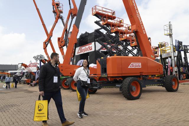 (260909) -- JOHANNESBURG, Sept. 9, 2026 (Xinhua) -- People visit the exhibition area of Electra Mining Africa at the Johannesburg Expo Centre in Johannesburg, South Africa, Sept. 8, 2026. Electra Mining Africa runs from Sept. 7 to 11. The event brings together mining companies, industry suppliers, contractors and thousands of professionals from across the continent. (Photo by James Blackmore/Xinhua)