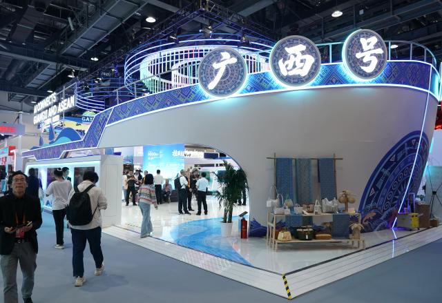 (260909) -- BEIJING, Sept. 9, 2026 (Xinhua) -- People visit the booth of Guangxi Zhuang Autonomous Region during the 2026 China International Fair for Trade in Services (CIFTIS) at Shougang Park in Beijing, capital of China, Sept. 9, 2026. The 2026 CIFTIS opened Wednesday in Beijing. (Xinhua/Zhang Chenlin)
