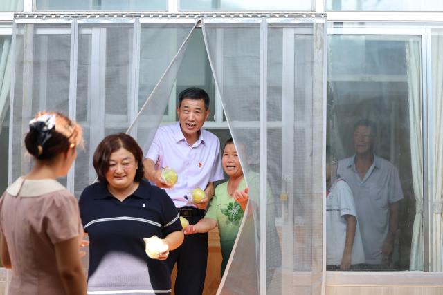 (260909) -- TIANJIN, Sept. 9, 2026 (Xinhua) -- Zheng Baoguo (3rd L) pays a home visit to a student in Luozhuangzi Town of Jizhou District in Tianjin, north China, on Sept. 3, 2026.
  The Sangyuan campus of Hongshuizhuang Central Primary School is located at the foot of the Yanshan Mountains in Jizhou District. The small rural school has just 28 students and serves three neighboring villages. It allows local children to attend classes close to home rather than travel nearly 10 kilometers to the town's central primary school.
  Zheng Baoguo, 56 and a native of Jizhou District, has worked at the school for more than 20 years. After graduating from a secondary normal school in 1989, he became a rural teacher. He has long believed that education is a key to a brighter future for children in mountainous areas.
  In 2003, Zheng became the first principal of the Sangyuan campus. Although he later had an opportunity to work in an urban school, he chose to stay and continue his career in his hometown. More than two decades later, Zheng still teaches classes himself despite serving as principal, and he always creates a relaxed and cheerful atmosphere for his students.
  "A teacher can change a child's life. As a teacher, I must live up to families' trust," Zheng said, "As long as the school remains open, I will keep doing my best to ensure that children in these mountain villages have access to education close to home." (Xinhua/Li Ran)
