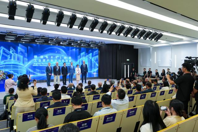 (260909) -- BEIJING, Sept. 9, 2026 (Xinhua) -- This photo taken on Sept. 9, 2026 shows a scene of the opening ceremony of the 8th International Symposium on Cultural Heritage Conservation by Digitalization in Beijing, capital of China. Themed on "Resonance: Intelligence for Heritage Alive," the event was held here on Wednesday. (Xinhua/Ju Huanzong)