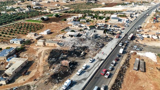 (260909) -- SYRIA, Sept. 9, 2026 (Xinhua) -- An aerial drone photo shows a view of the site of an explosion at an ammunition storage site near the city of Sarmada in Syria's northwestern Idlib province, Sept. 9, 2026. At least three people were killed and more than 10 others injured on Wednesday in the explosion, according to preliminary reports. (Str/Xinhua)