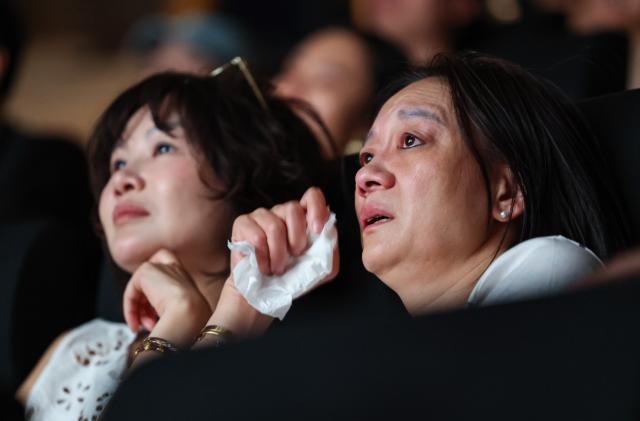 (260909) -- VENICE, Sept. 9, 2026 (Xinhua) -- People watch the Chinese film "Dear You" during its Italian screening in Venice, Italy, Sept. 8, 2026. The film was screened at the M9 Museum in Mestre, Venice, as part of a Chinese-language film promotion program held during the 83rd Venice International Film Festival. (Xinhua/Wang Kaiyan)
