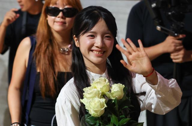 (260909) -- VENICE, Sept. 9, 2026 (Xinhua) -- Actress Li Sitong of the Chinese film "Dear You" attends its Italian screening in Venice, Italy, Sept. 8, 2026. The film was screened at the M9 Museum in Mestre, Venice, as part of a Chinese-language film promotion program held during the 83rd Venice International Film Festival. (Xinhua/Wang Kaiyan)