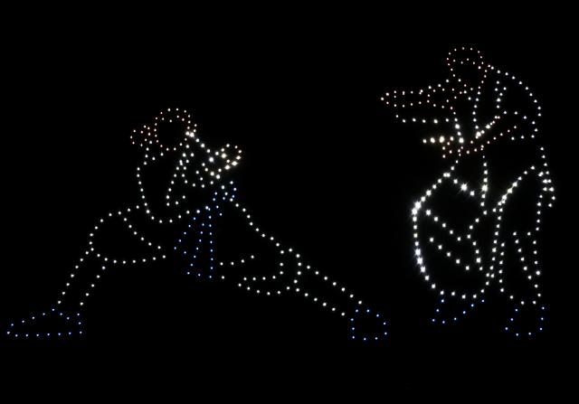 (260909) -- GABORONE, Sept. 9, 2026 (Xinhua) -- A drone formation depicts people practicing Chinese Kung fu during a drone light show in Gaborone, Botswana, on Sept. 8, 2026. TO GO WITH "Drone light show brightens China-Botswana people-to-people exchanges" (Xinhua/Tshekiso Tebalo)