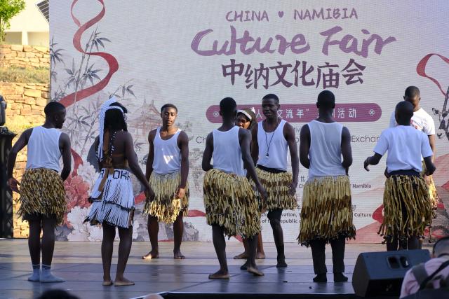 (260909) -- WINDHOEK, Sept. 9, 2026 (Xinhua) -- Namibian folk dancers stage a performance during the China-Namibia Culture Fair in Windhoek, Namibia, Sept. 8, 2026. TO GO WITH "Feature: Pipa strings, Kavango drums resound as China-Namibia culture fair roars to life in Windhoek" (Photo by Musa C Kaseke/Xinhua)