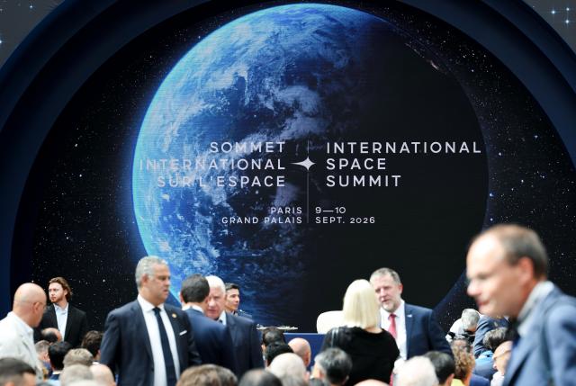 (260909) -- PARIS, Sept. 9, 2026 (Xinhua) -- People gather during the International Space Summit at the Grand Palais in Paris, France, Sept. 9, 2026. The first International Space Summit opened Wednesday in Paris, bringing together heads of state and government, scientists, astronauts and industry representatives. (Xinhua/Wu Huiwo)