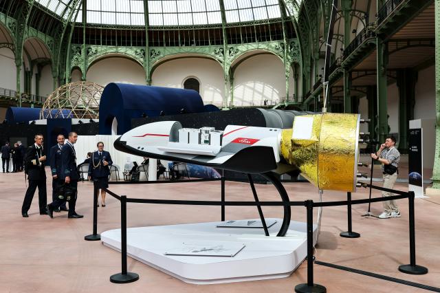 (260909) -- PARIS, Sept. 9, 2026 (Xinhua) -- An exhibit is seen during the International Space Summit at the Grand Palais in Paris, France, Sept. 9, 2026. The first International Space Summit opened Wednesday in Paris, bringing together heads of state and government, scientists, astronauts and industry representatives. (Xinhua/Wu Huiwo)