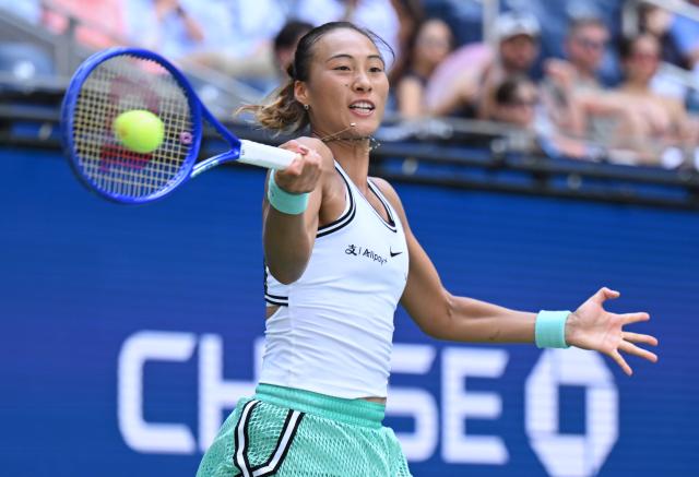 (260910) -- NEW YORK, Sept. 10, 2026 (Xinhua) -- Zheng Qinwen hits a return during the women's singles quarterfinal between Elena Rybakina of Kazakhstan and Zheng Qinwen of China at the 2026 US Open tennis championships in New York, the United States, Sept. 9, 2026. (Xinhua/Li Rui)